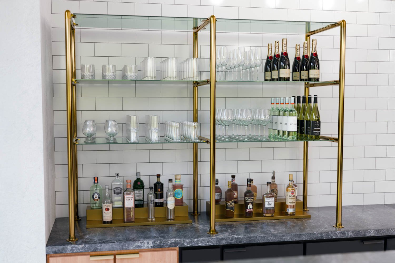 bistro-style brass pipe bar shelving