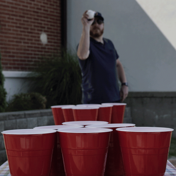 shooting a pong ball in beer pong