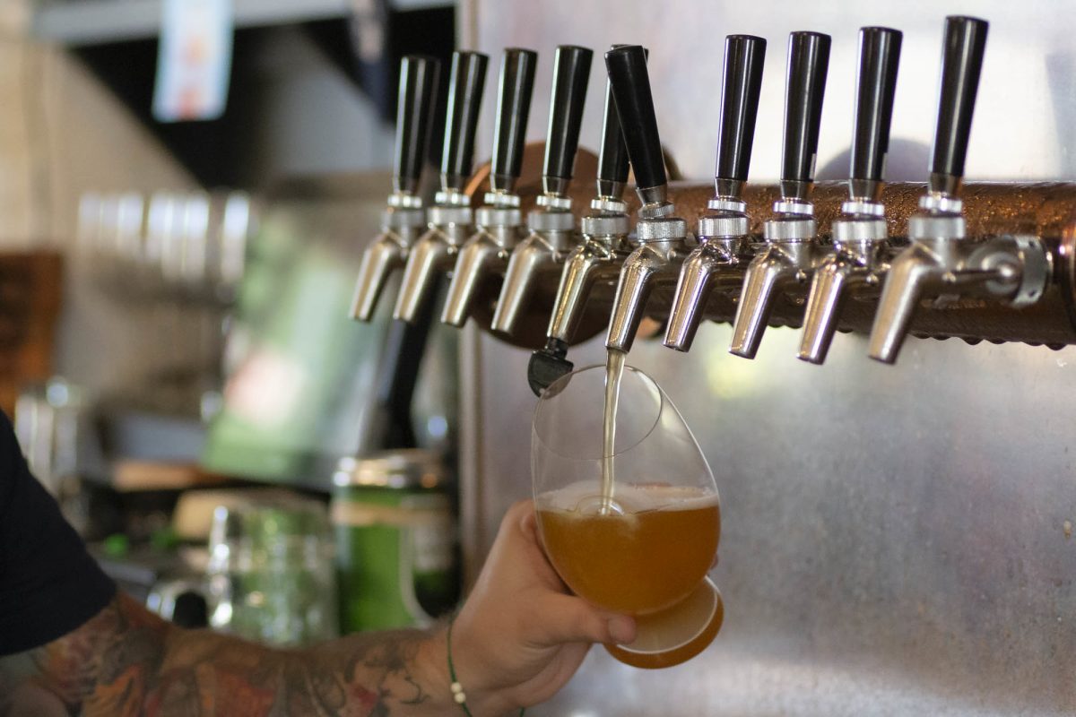 Pouring draft beer from a tap