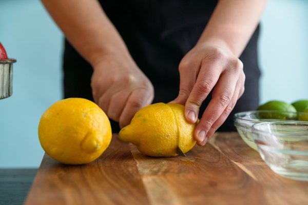 Cutting a lemon in half